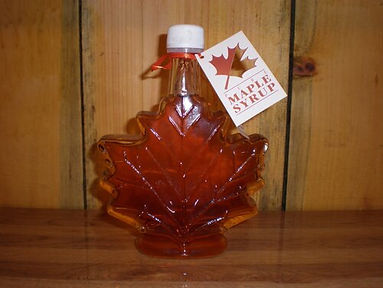 Maple syrup in a leaf-shaped bottle
