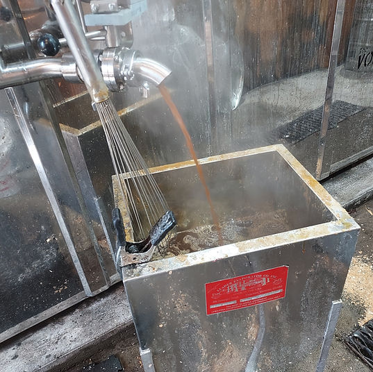 Sap boiling in a wood-fired evaporator